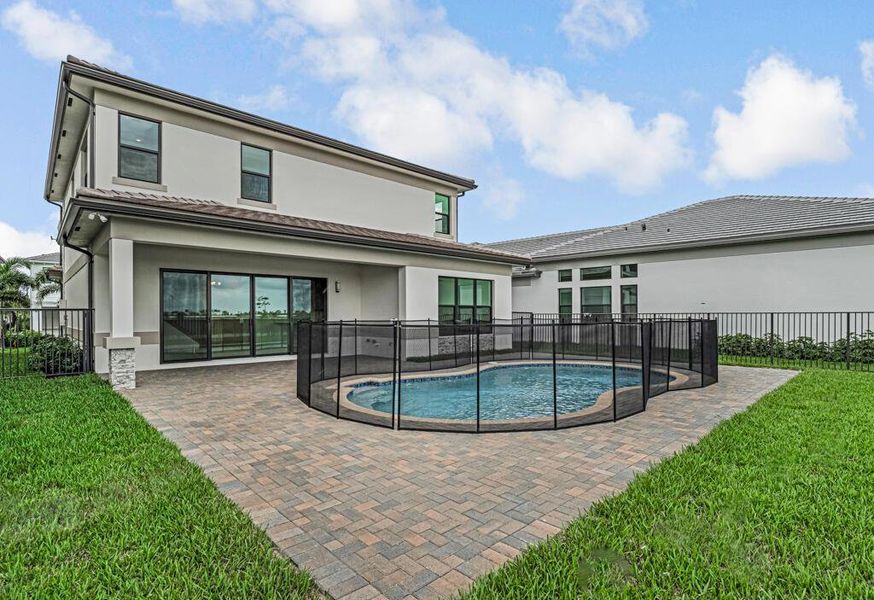 Exterior details and patio area of a home in Apex at Avenir, Palm Beach Gardens (Image 34).