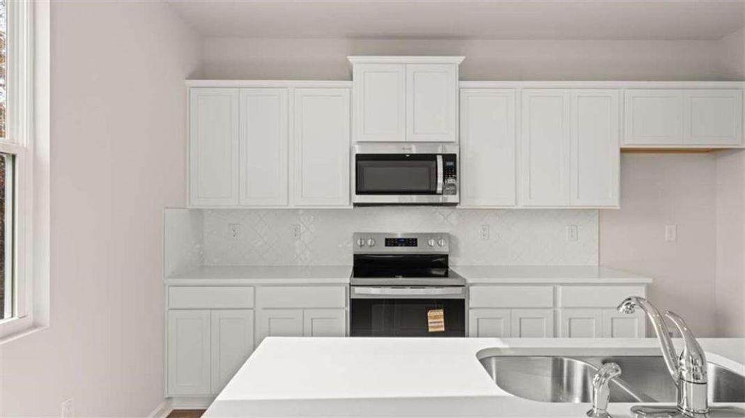 Furnished interior view inside a new home in The Reserve at Calcutta, Stockbridge (Image 5).