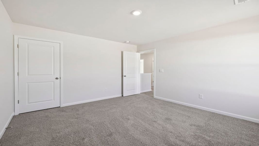Spacious, unfurnished interior of a new home in Waverly Station, Greenwood (Image 29).