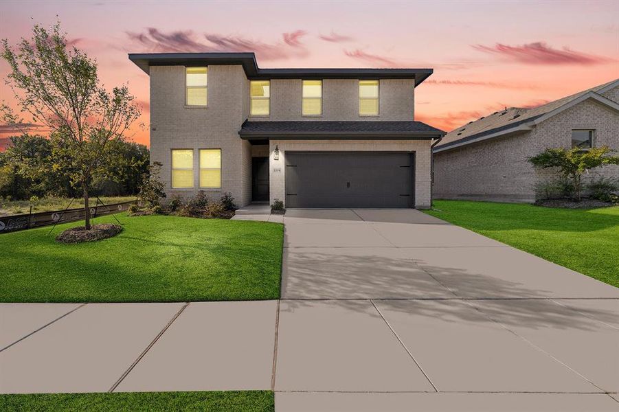 Front exterior of a new home in Aspire at Noble Ridge, Howe, TX, highlighting curb appeal (Image 1). Front exterior of a new home in Aspire at Noble Ridge, Howe, TX, highlighting curb appeal (Image 1).