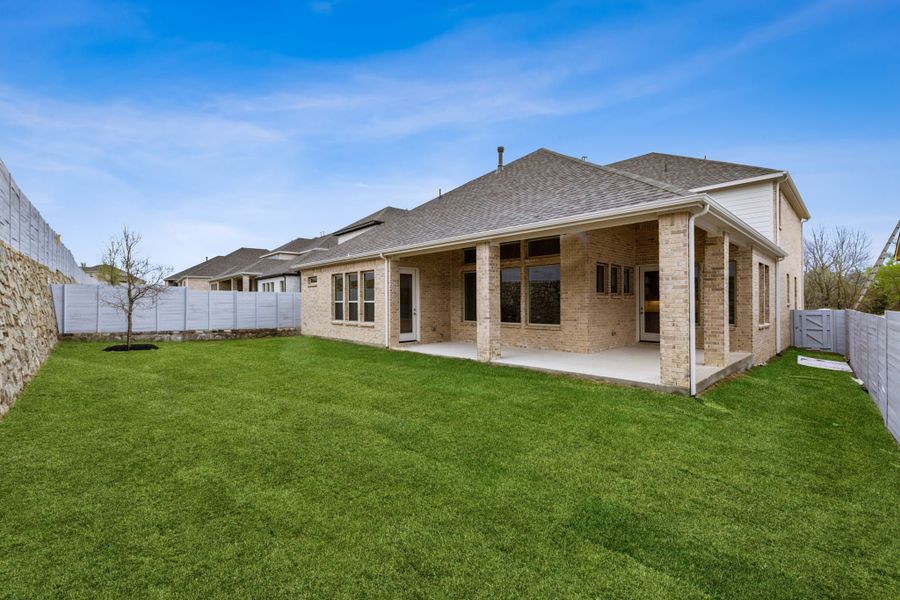 Exterior details and patio area of a home in Painted Tree Lakeside, McKinney (Image 21).