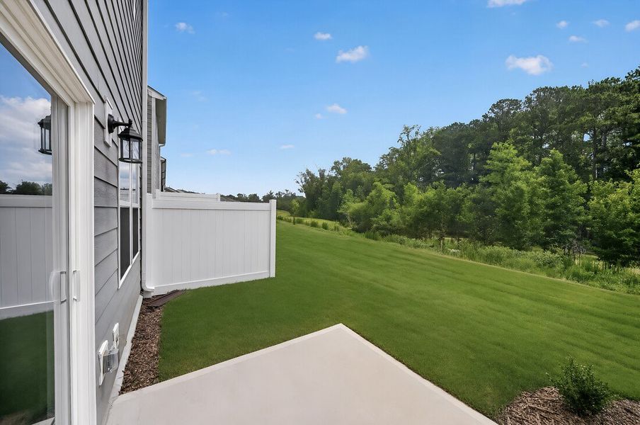 Exterior details and patio area of a home in Magnolia Townes, Wendell (Image 3).
