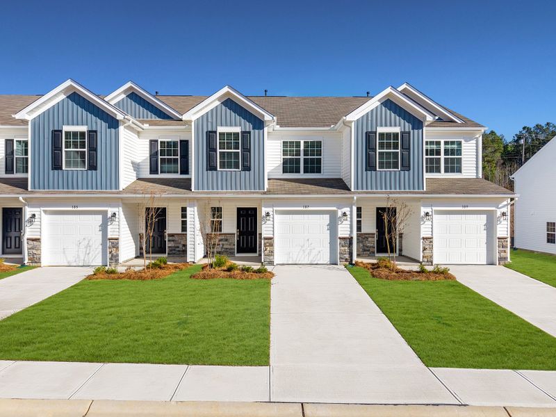 Front exterior of a new home in Springdale Townes, Clinton, SC, highlighting curb appeal (Image 1). Front exterior of a new home in Springdale Townes, Clinton, SC, highlighting curb appeal (Image 1).