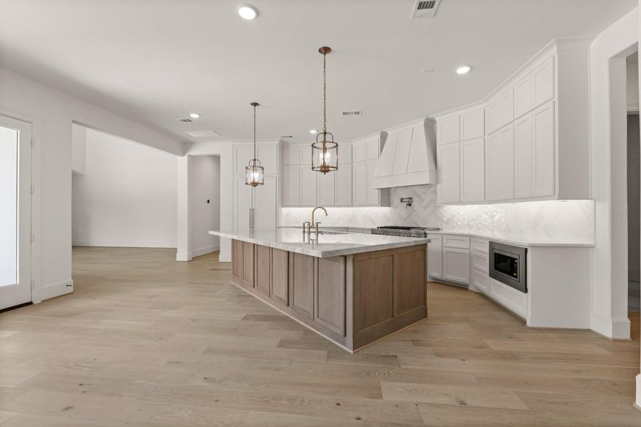 Furnished interior view inside a new home in The Park and The Reserve, Fulshear (Image 10).