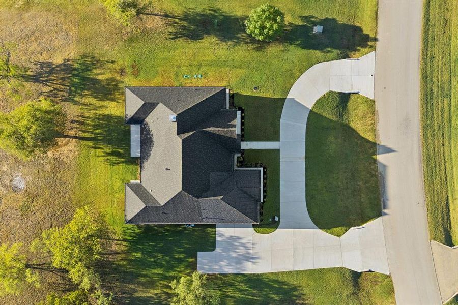 An overhead shot of the property; over 1 acre - the backyard extends further back!