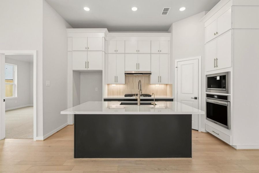 Furnished interior view inside a new home in Bridgeland 45', 50', 70', Cypress (Image 4). Furnished interior view inside a new home in Bridgeland 45', 50', 70', Cypress (Image 4).