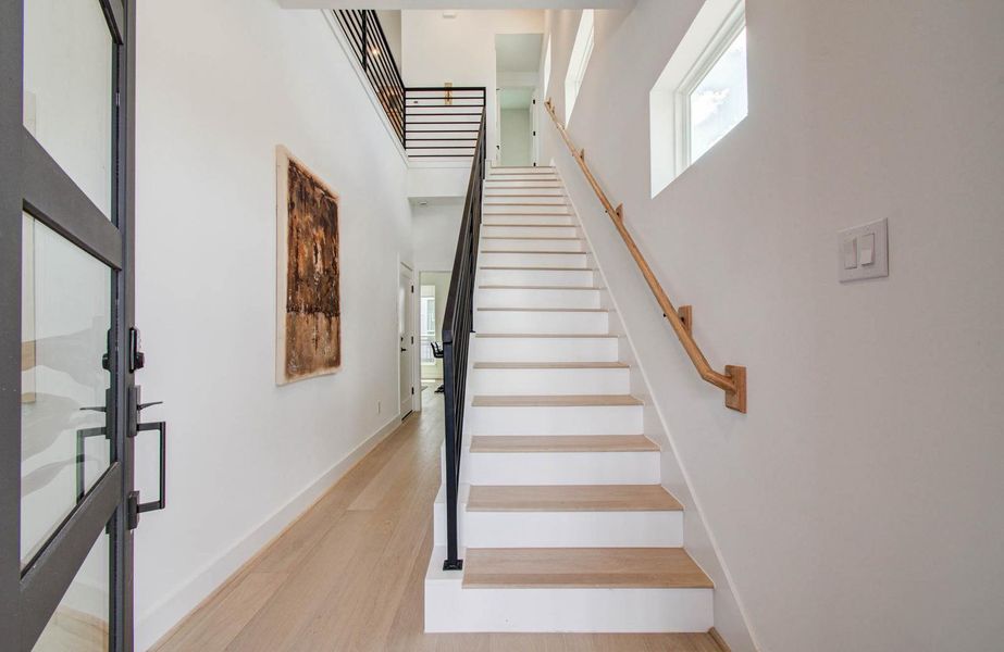 welcome to your double ceiling entry foyer