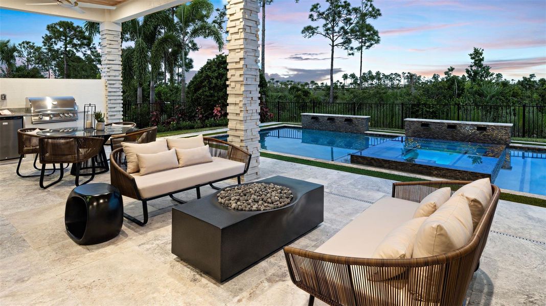 Exterior details and patio area of a home in L'Ambiance at Avenir, Palm Beach Gardens (Image 24).