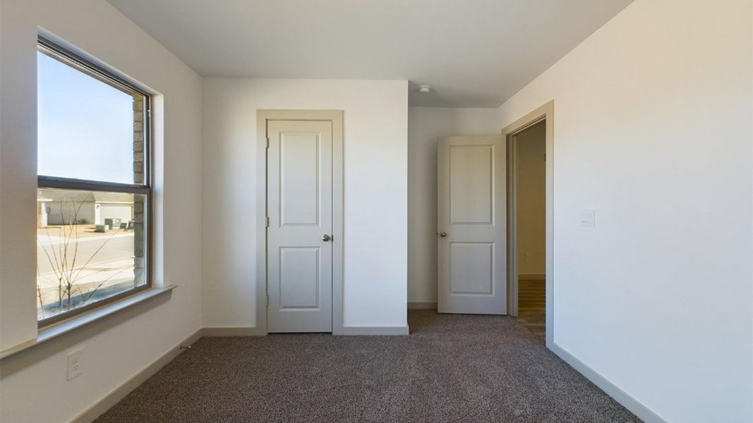 Representative unfurnished interior of a home built from the The Lakeway by D.R. Horton in Abbey Glen, Lubbock (Image 19).