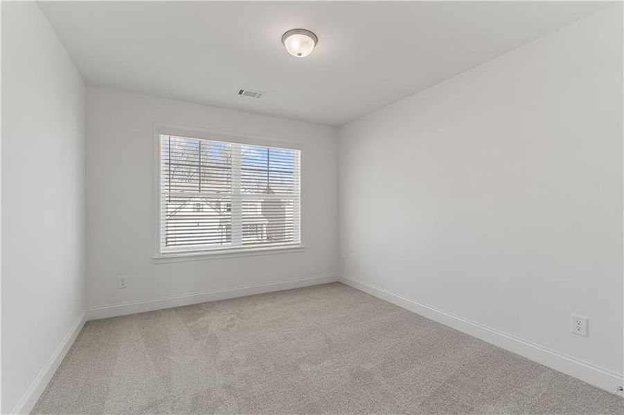 Spacious, unfurnished interior of a new home in Clark Farms, Flowery Branch (Image 23).