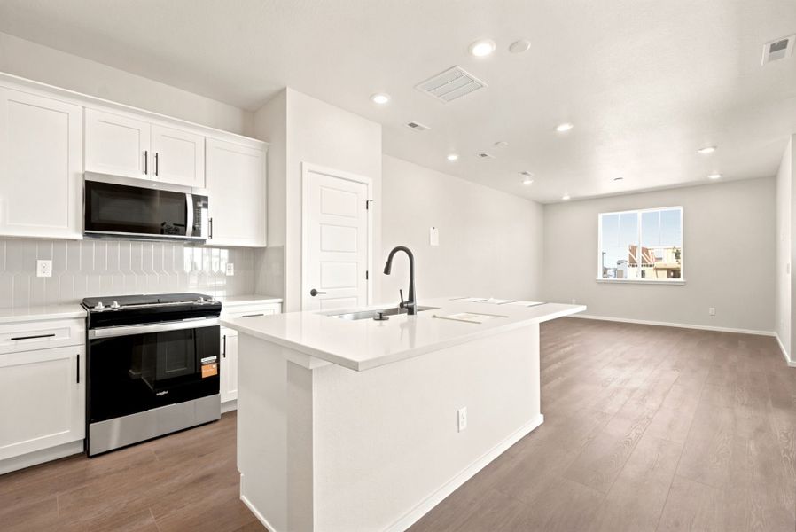 Furnished interior view inside a new home in Sky Ranch, Watkins (Image 9).