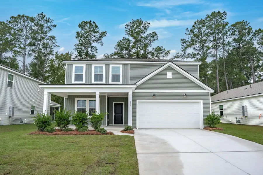 Front exterior of a new home in Bradford Pointe, Summerville, SC, highlighting curb appeal (Image 18).