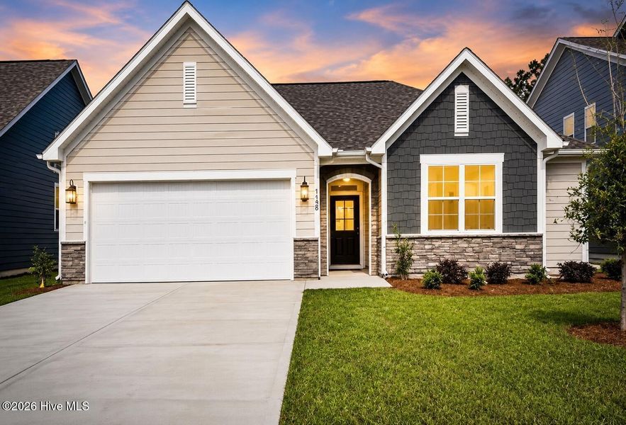 Front exterior of a new home in Terrapin, Leland, NC, highlighting curb appeal (Image 1). Front exterior of a new home in Terrapin, Leland, NC, highlighting curb appeal (Image 1).