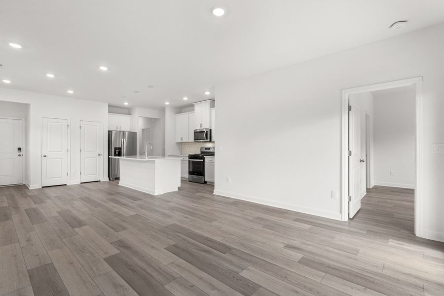 Spacious, unfurnished interior of a new home in Cypress Ridge - The Boardwalk Series, Longs (Image 14).