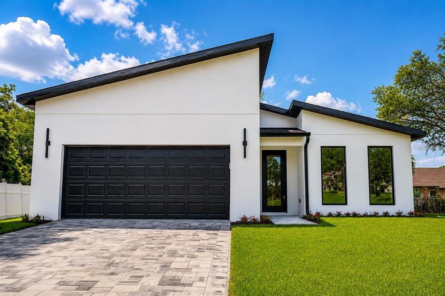 Front exterior of a new home in , Port Charlotte, FL, highlighting curb appeal (Image 31).
