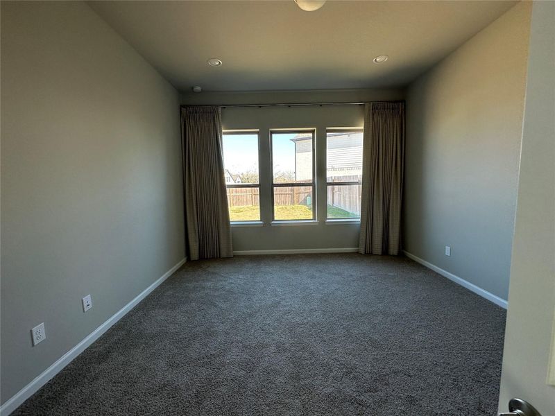 Spacious, unfurnished interior of a new home in Sienna, Missouri City (Image 21).