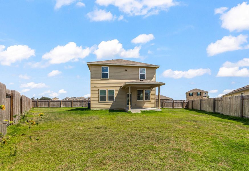 Back of property with a patio and a fenced backyard Back of property with a patio and a fenced backyard