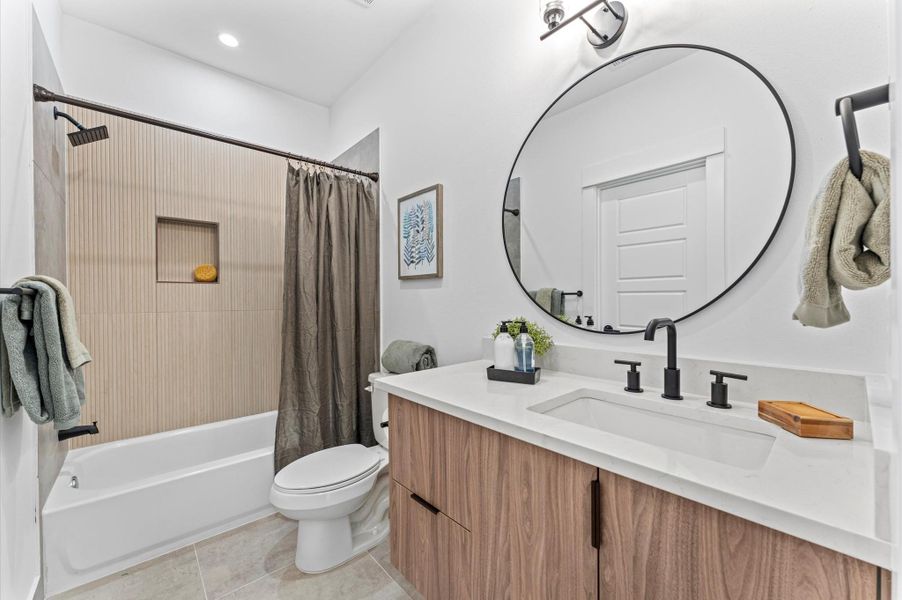 The jack&jill bathroom includes a tub-shower combo, and thoughtful design elements that balance convenience with style—perfect for busy mornings or relaxed evenings. The jack&jill bathroom includes a tub-shower combo, and thoughtful design elements that balance convenience with style—perfect for busy mornings or relaxed evenings.