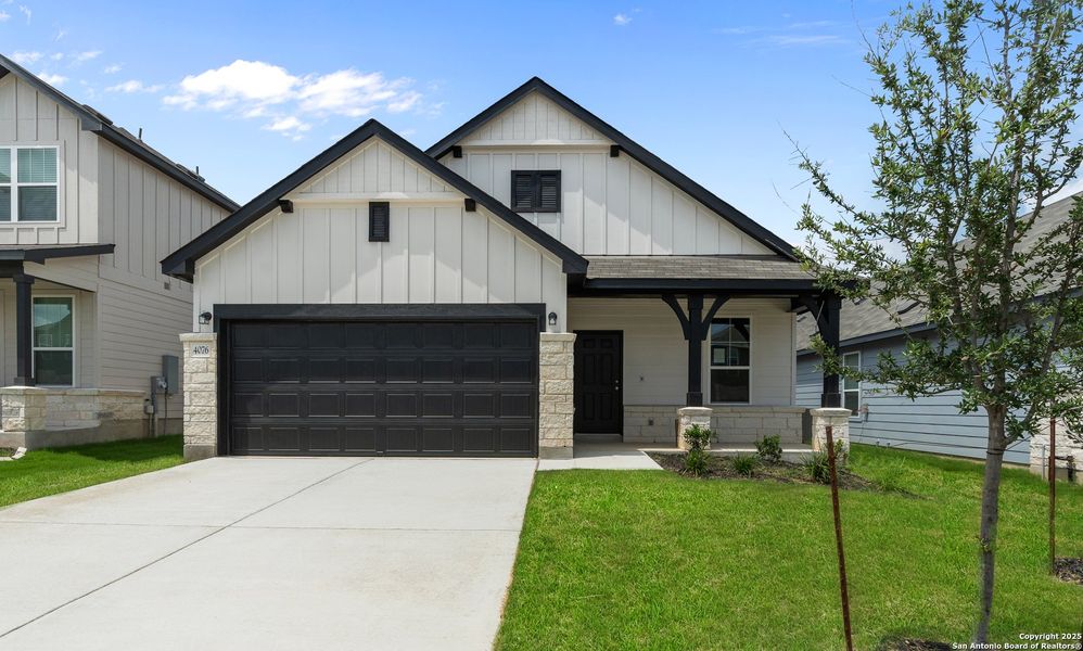 Front exterior of a new home in Lily Springs, Seguin, TX, highlighting curb appeal (Image 17).