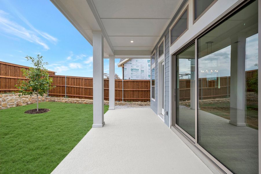 Exterior details and patio area of a home in Walsh Classic, Fort Worth (Image 3).