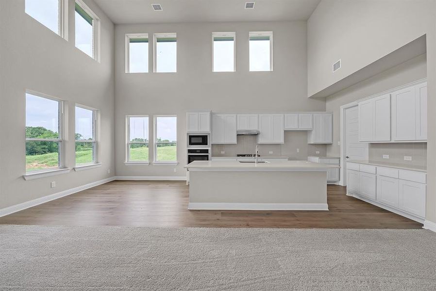 Furnished interior view inside a new home in Eagle Estates, Cross Timber (Image 7).