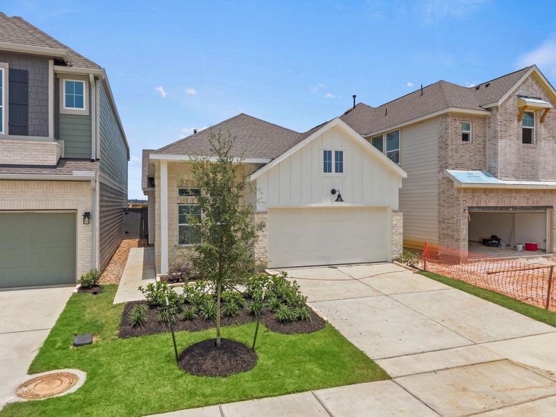 Front exterior of a new home in Jubilee Chateau, Hockley, TX, highlighting curb appeal (Image 22). Front exterior of a new home in Jubilee Chateau, Hockley, TX, highlighting curb appeal (Image 22).