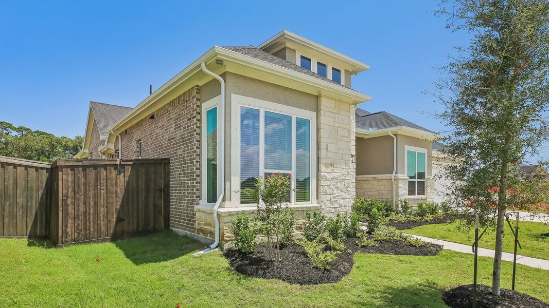 Exterior details and patio area of a home in Riceland 60',65',70', Mont Belvieu (Image 3).