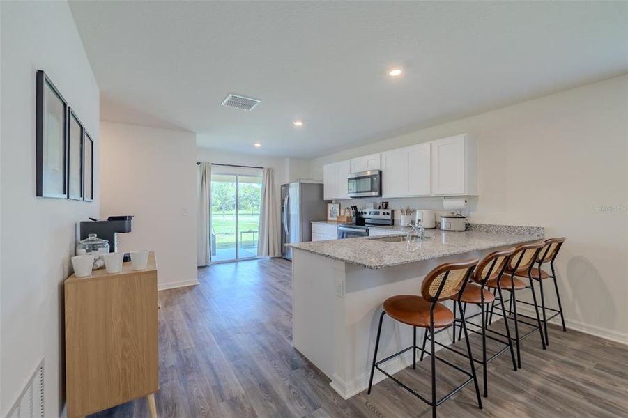 Furnished interior view inside a new home in , Eagle Lake (Image 7).