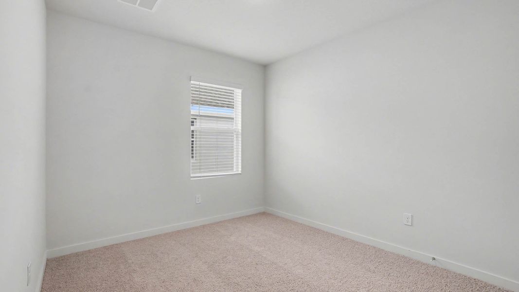 Spacious, unfurnished interior of a new home in Venetian Grove, Vero Beach (Image 20).