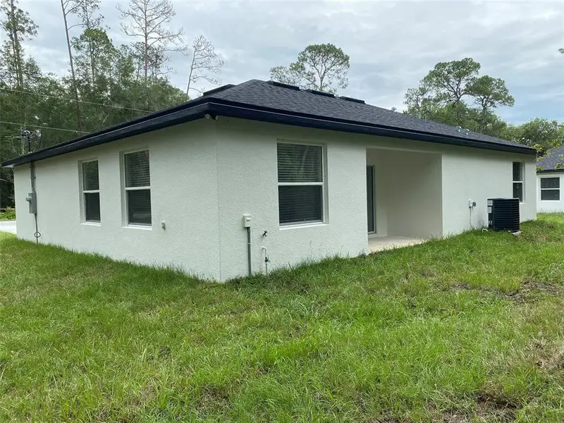 Exterior details and patio area of a home in , Ocala (Image 4). Exterior details and patio area of a home in , Ocala (Image 4).