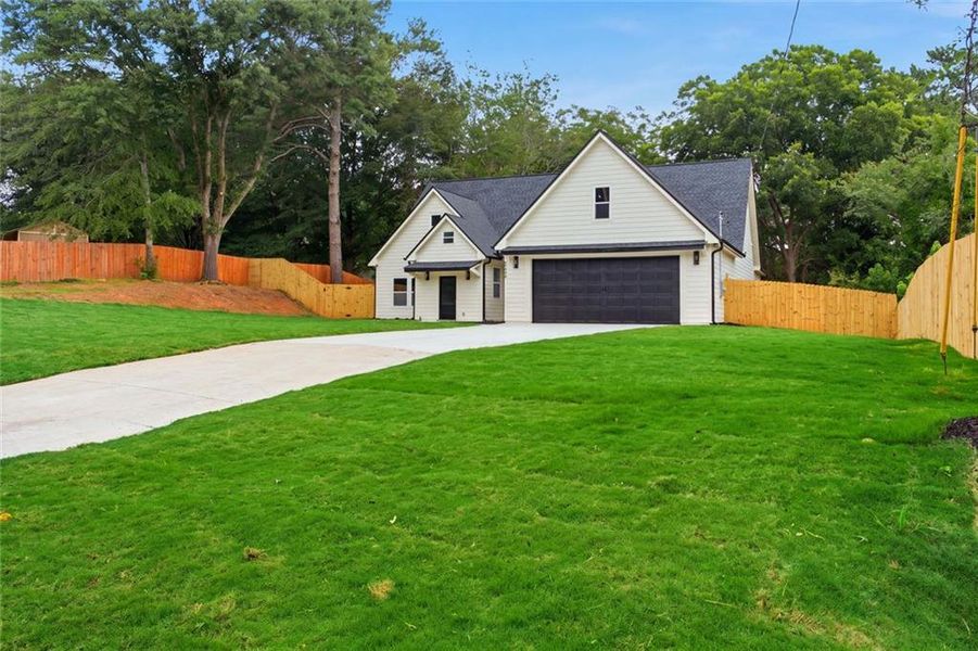 Front exterior of a new home in , Douglasville, GA, highlighting curb appeal (Image 30).