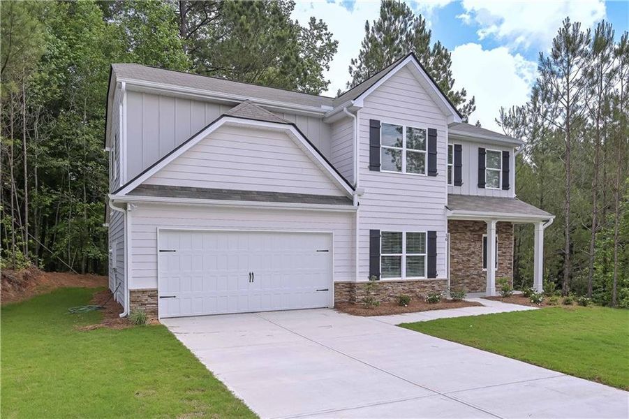 Front exterior of a new home in , Villa Rica, GA, highlighting curb appeal (Image 1). Front exterior of a new home in , Villa Rica, GA, highlighting curb appeal (Image 1).