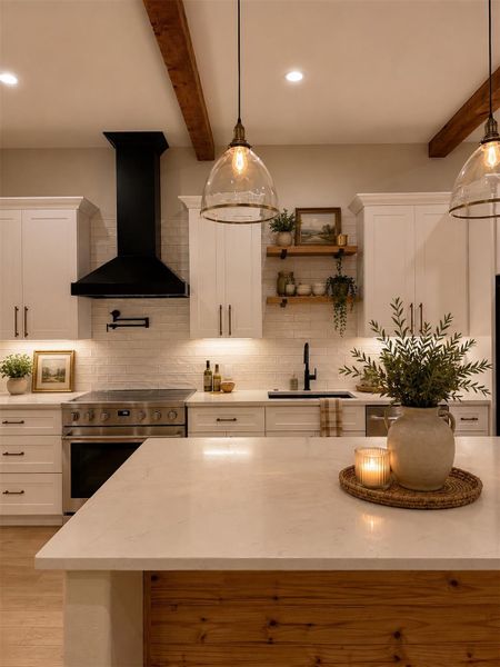 Exposed wooden ceiling beams and a large quartz-topped island ground this modern culinary workspace.Virtual Staging. Exposed wooden ceiling beams and a large quartz-topped island ground this modern culinary workspace.Virtual Staging.