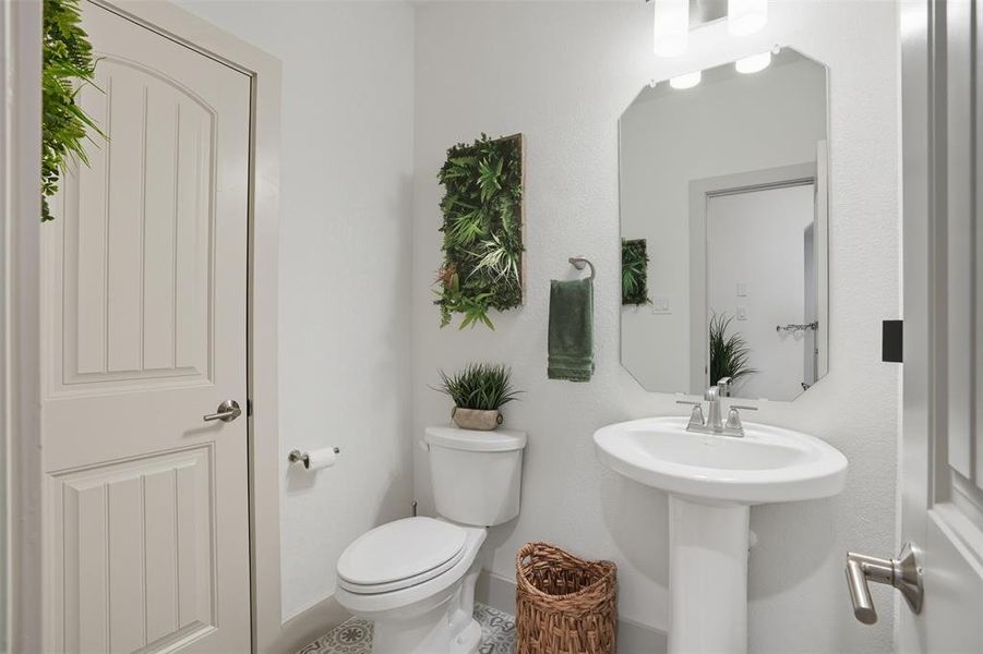 Half bath featuring toilet Half bath featuring toilet