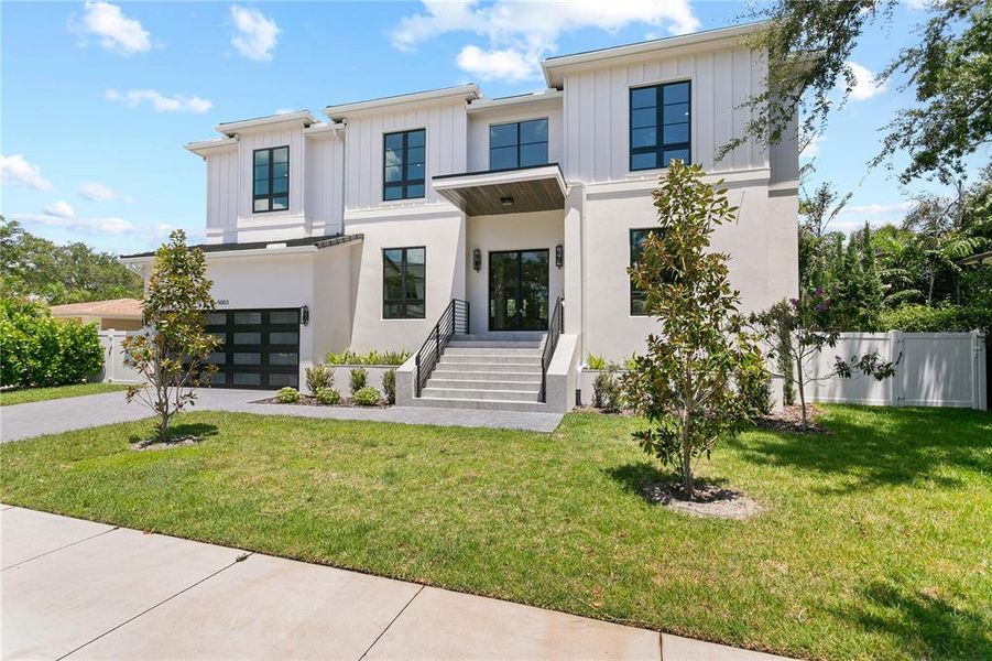 Front exterior of a new home in , Tampa, FL, highlighting curb appeal (Image 31). Front exterior of a new home in , Tampa, FL, highlighting curb appeal (Image 31).