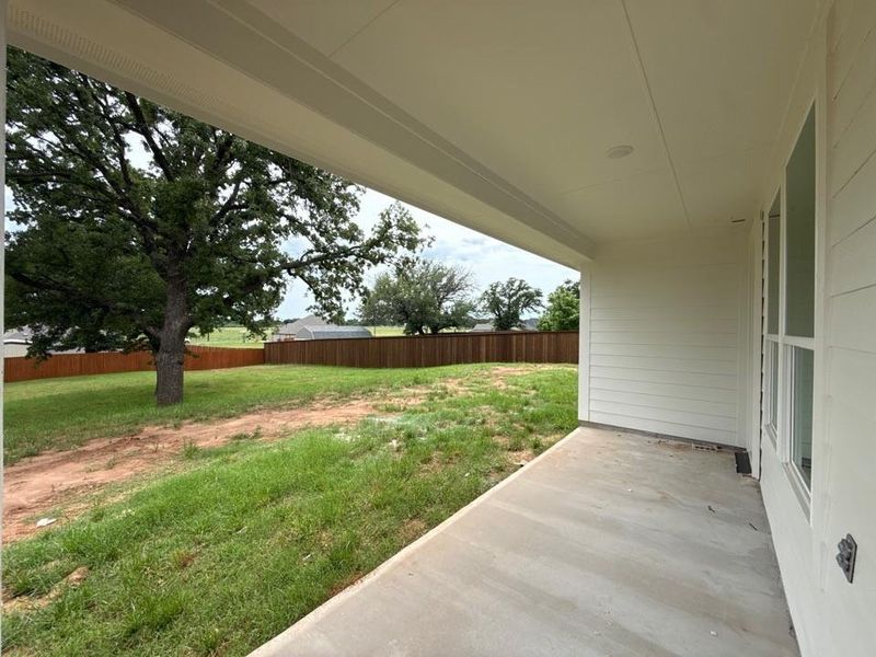 Exterior details and patio area of a home in Covenant Springs, Springtown (Image 3).