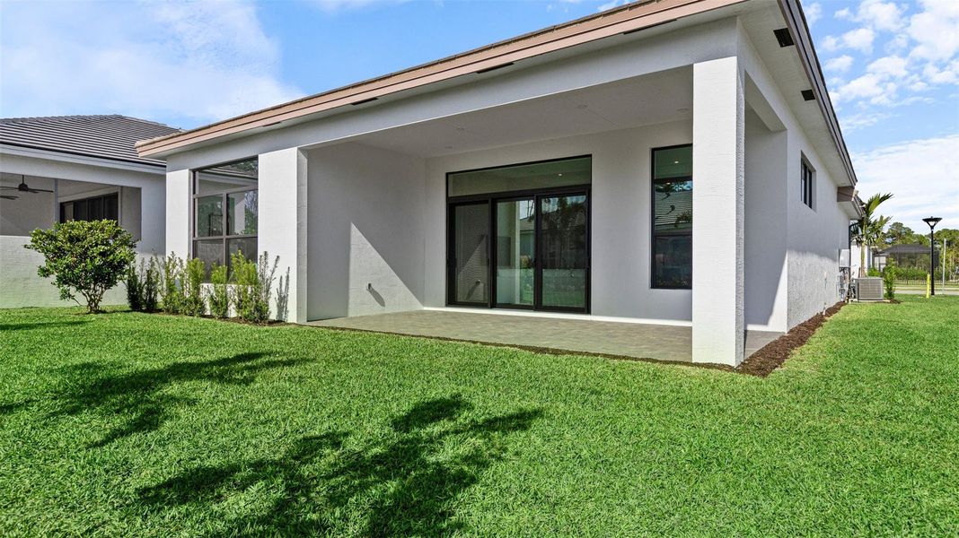 Exterior details and patio area of a home in Cove Royale, Stuart (Image 28).