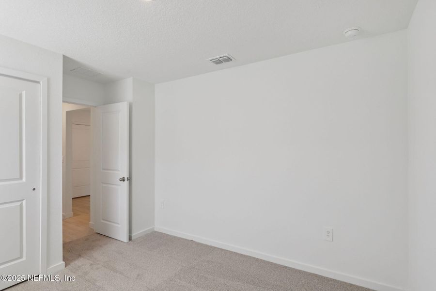 Spacious, unfurnished interior of a new home in Cypress Meadows - Signature Series, Jacksonville (Image 21).