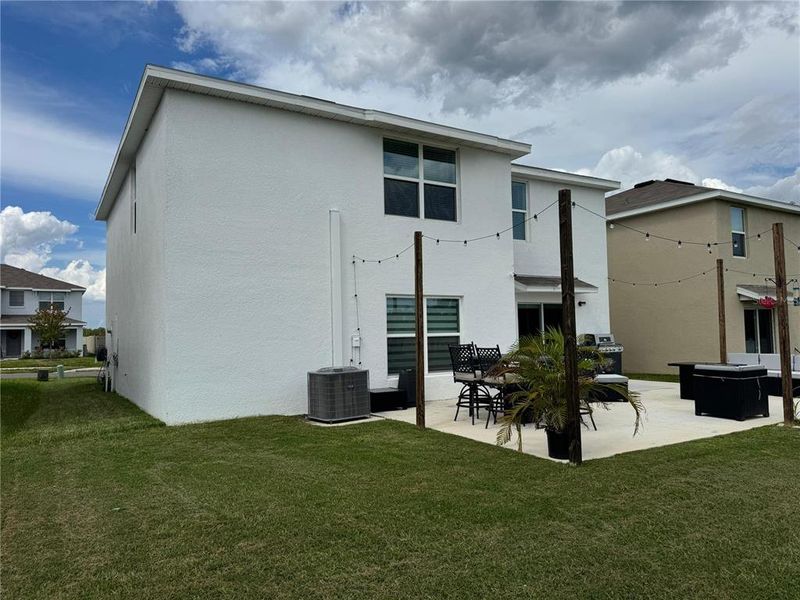 Front exterior of a new home in Zephyr Ridge, Zephyrhills, FL, highlighting curb appeal (Image 2).