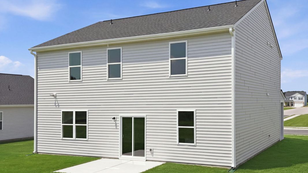 Exterior details and patio area of a home in East Ridge, Ayden (Image 4).