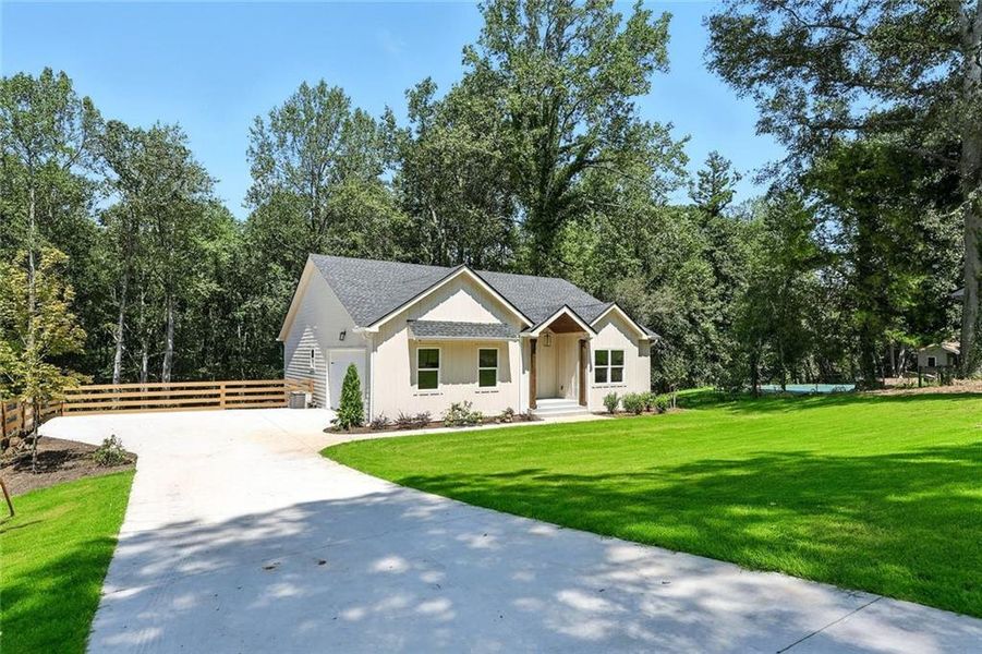 Front exterior of a new home in , Gainesville, GA, highlighting curb appeal (Image 17). Front exterior of a new home in , Gainesville, GA, highlighting curb appeal (Image 17).