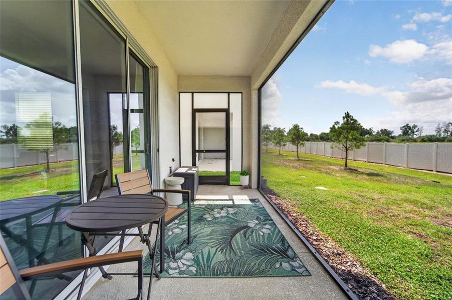 Exterior details and patio area of a home in Mangrove Point, Apollo Beach (Image 26).