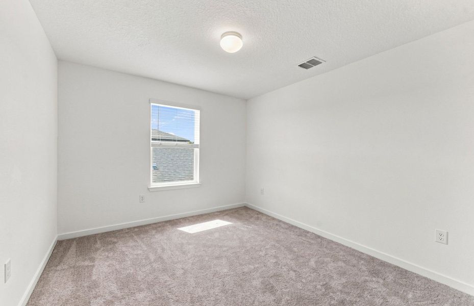 Spacious, unfurnished interior of a new home in Twisted Oaks, Wildwood (Image 20).
