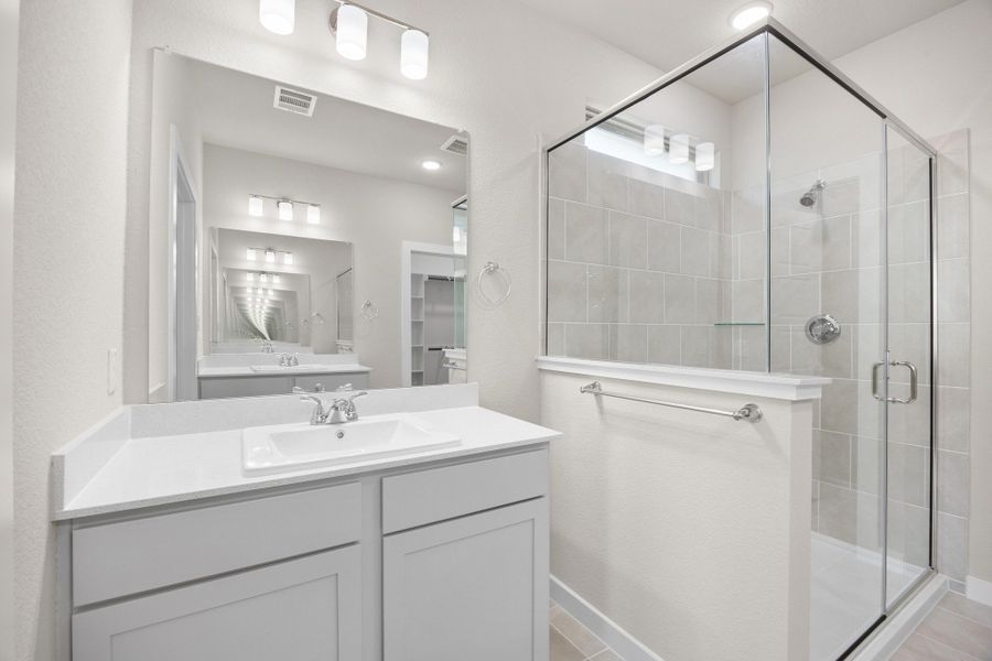 Primary Bath in the Elm home plan by Trophy Signature Homes – REPRESENTATIVE PHOTO Primary Bath in the Elm home plan by Trophy Signature Homes – REPRESENTATIVE PHOTO