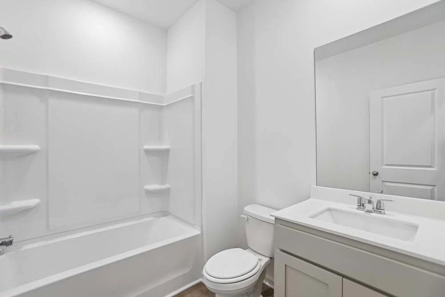 Sample Photo: Guest Bathroom featuring Artisan Collection Finishes Sample Photo: Guest Bathroom featuring Artisan Collection Finishes