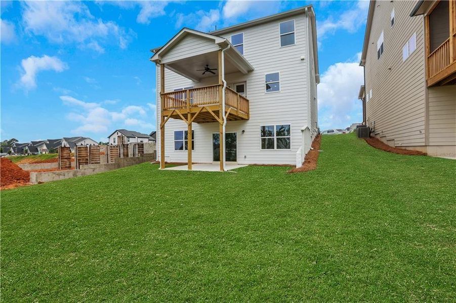 Front exterior of a new home in Twin Lakes, Hoschton, GA, highlighting curb appeal (Image 23). Front exterior of a new home in Twin Lakes, Hoschton, GA, highlighting curb appeal (Image 23).