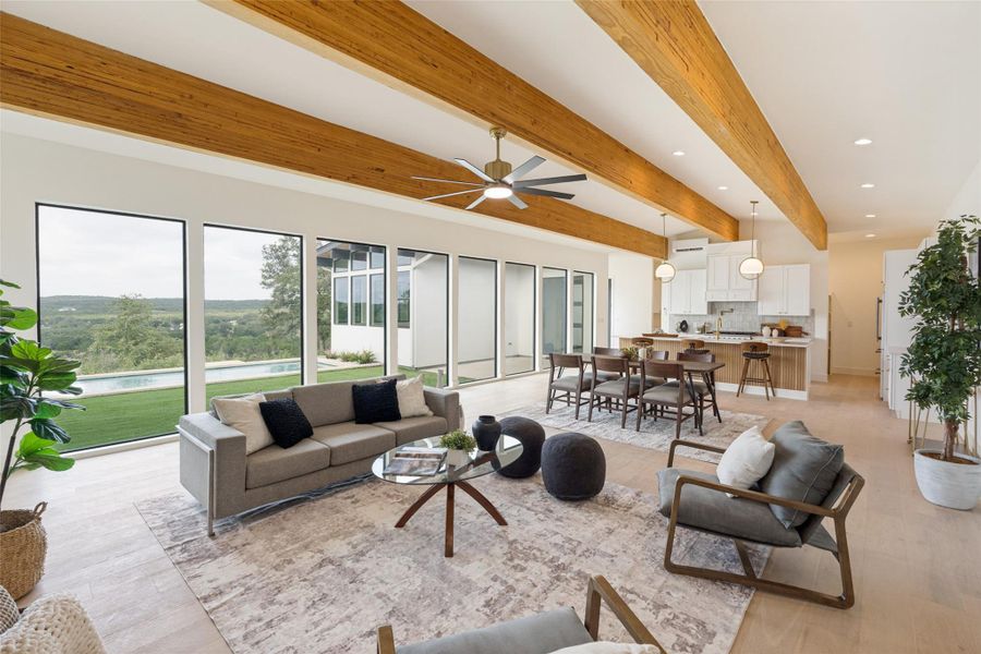 Exposed wood beams add architectural interest to this modern, well-appointed kitchen.