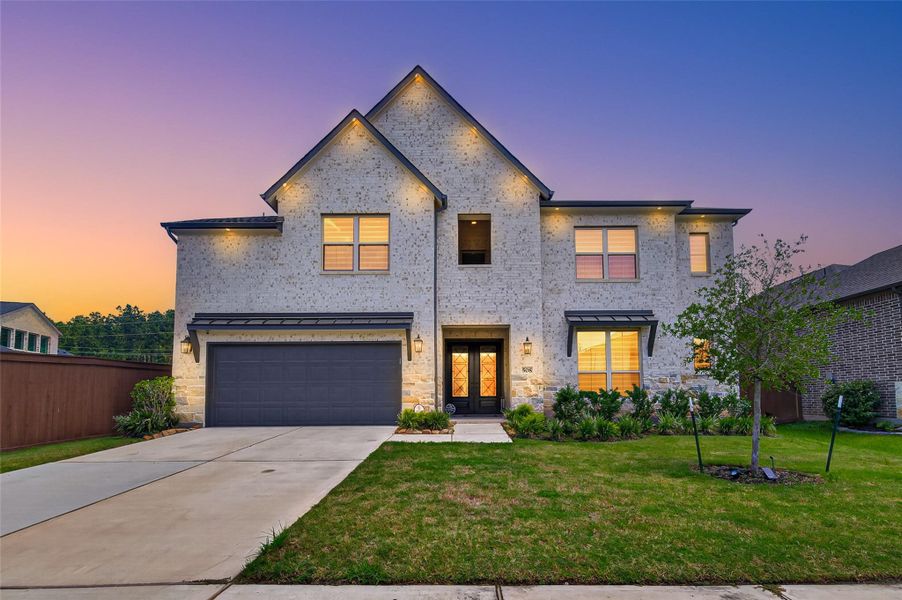 Front exterior of a new home in The Trails, New Caney, TX, highlighting curb appeal (Image 1). Front exterior of a new home in The Trails, New Caney, TX, highlighting curb appeal (Image 1).