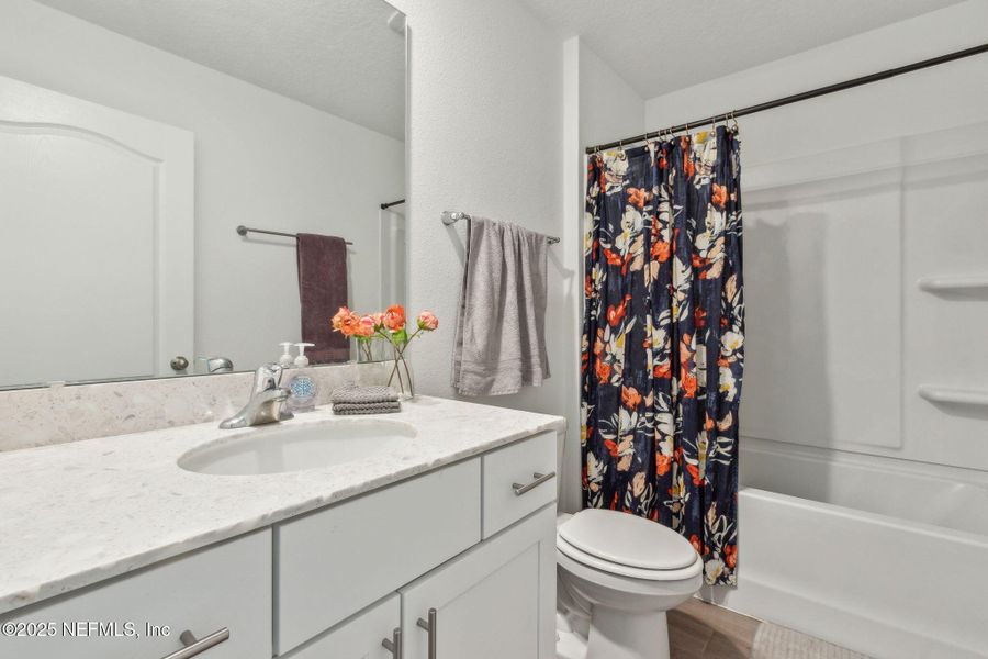 Furnished interior view inside a new home in Dorado at Entrada, St. Augustine (Image 30).