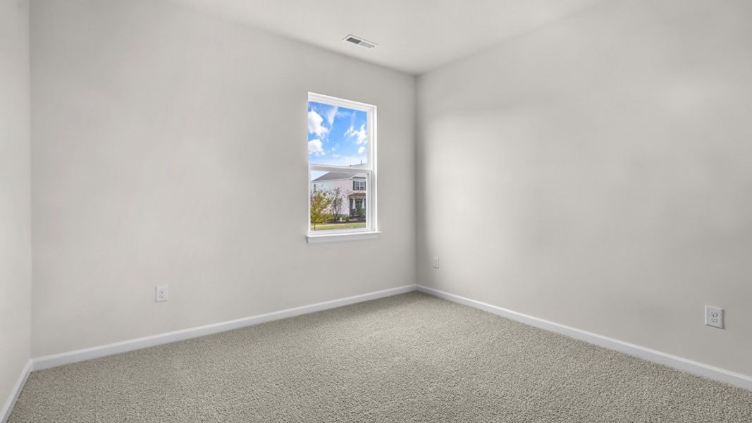Spacious, unfurnished interior of a new home in The Reserve at Prestleigh, Wake Forest (Image 21).